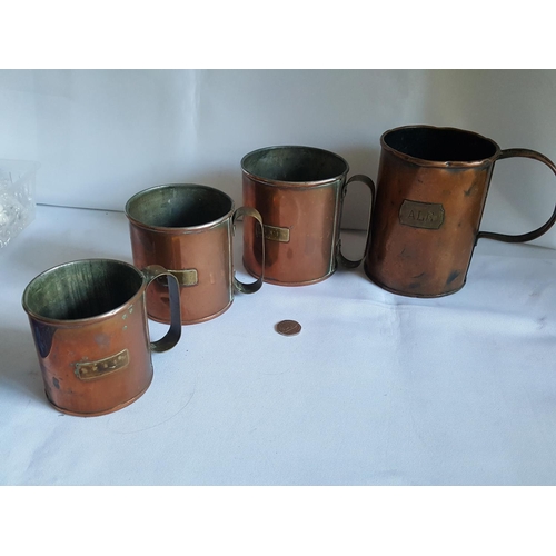 93 - antique grain measures & an ale tankard
