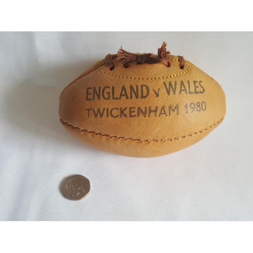 104 - miniature leather rugby ball 1980s