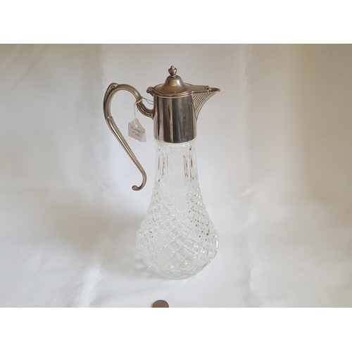 63 - silver plated claret jug