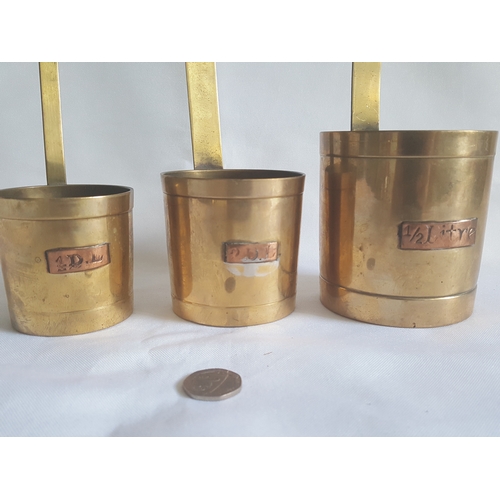 73 - 3 vintage brass measures