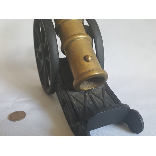 74 - brass & cast iron cannon