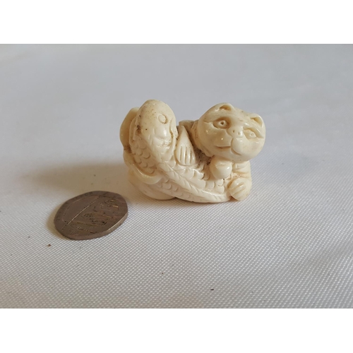 56 - carved Chinese cat & fish