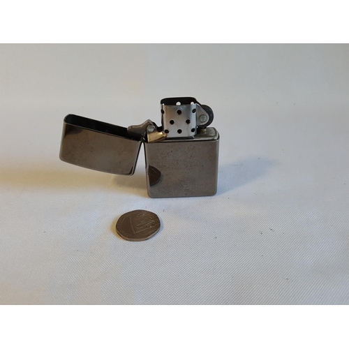 6 - Zippo lighter