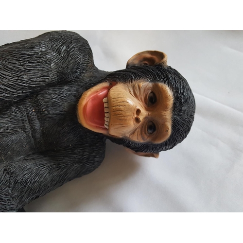 153 - mischievous hanging chimp heavy resin