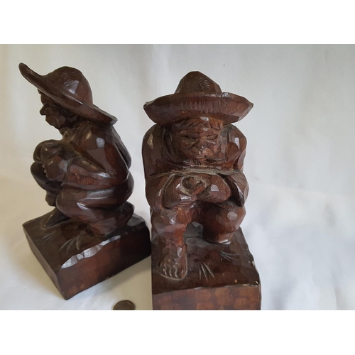 155 - heavy carved Mexican wooden bookends