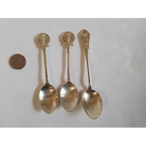 390 - 3 HM silver golfing spoons