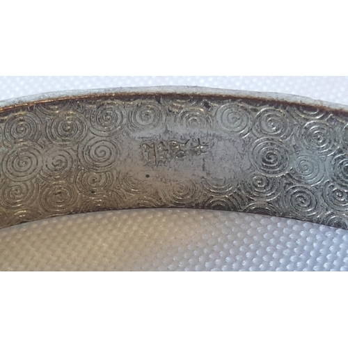 41 - white metal bangle marked