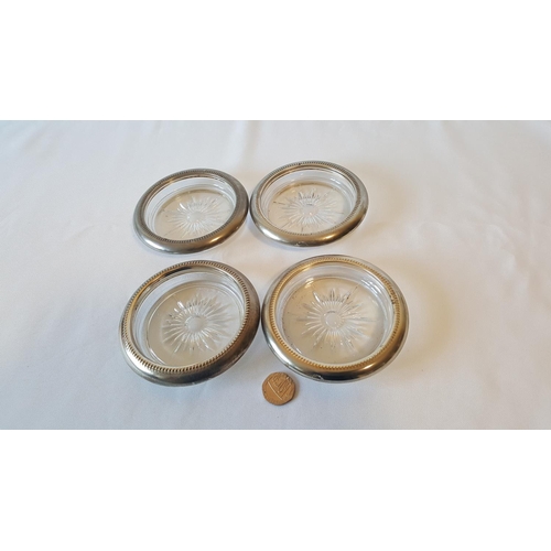 72 - 4 silver plated glass coasters