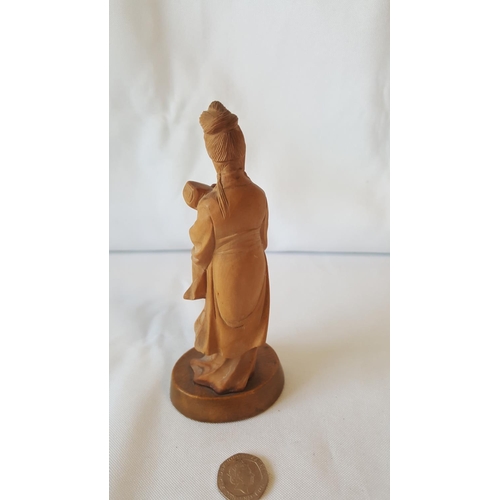 105 - wooden carving of Asian lady