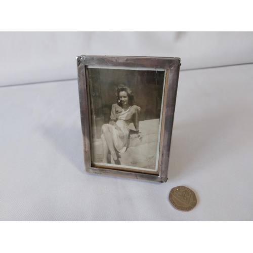 104 - HM silver oblong photo frame with stand 1990s