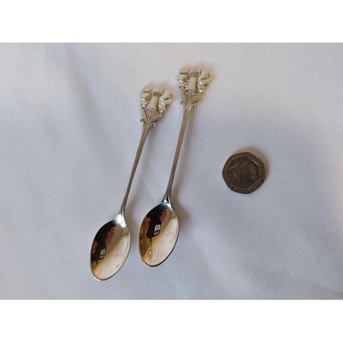 194 - 2 HM silver spoons bell tops