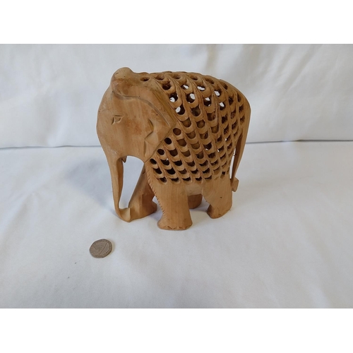 280 - carved elephant with small elephant inside