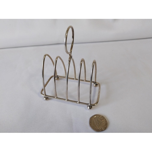 61 - HM silver toast rack c1925