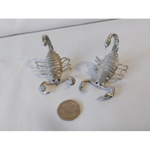 71 - tested silver pair of scorpions