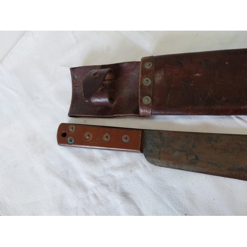 51 - British WW2 Machete in leather scabbard both marked 1943