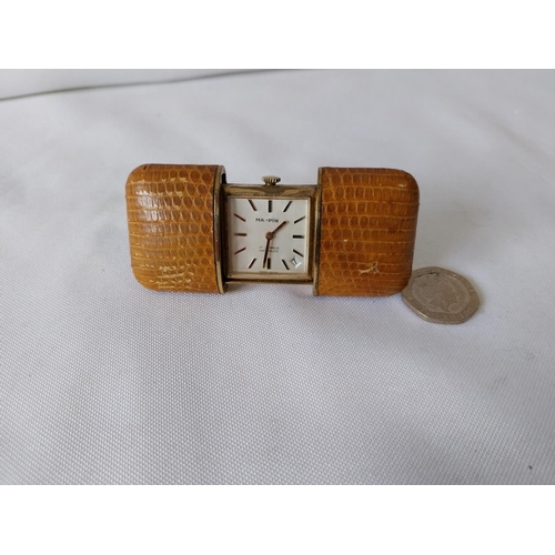 192 - 1940s/50s Mappin 17 jewels sliding purse travel clock in lizard case