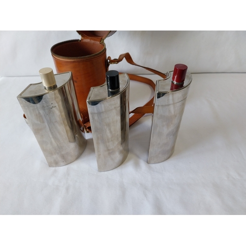 117 - English leather cased triple flask set with 4 gilt shot glasses