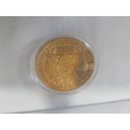 71 - The British Medical Association gold plated coin