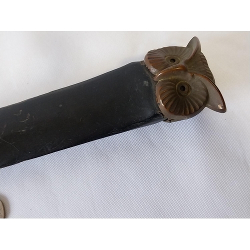 207 - bronze owl headed ebony page turner