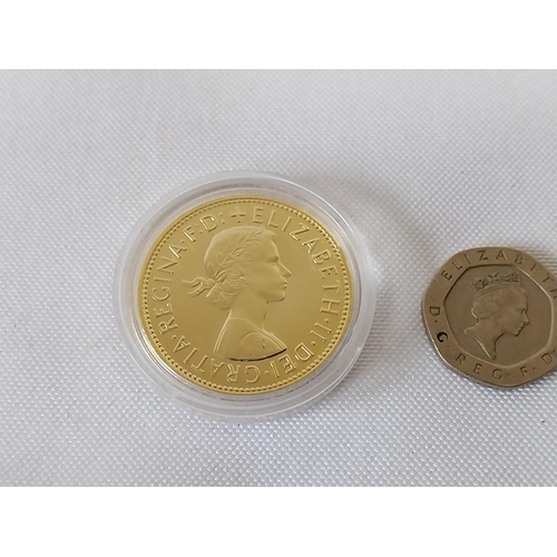 195 - gold plated & enamelled penny in capsule