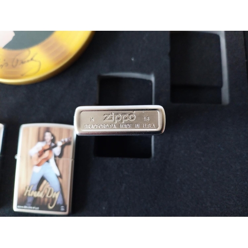 21 - 7 Elvis Zippo lighters all unused in a display box