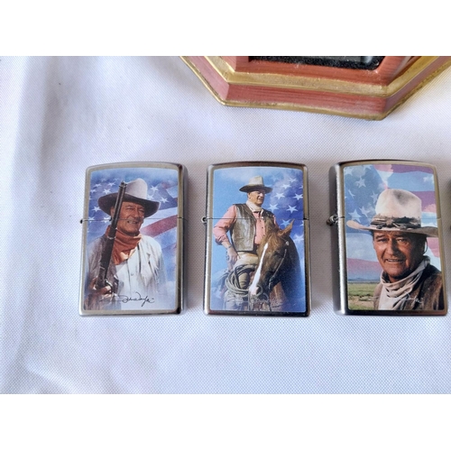 22 - 5 John Wayne Zippo lighters all unused with display stand (hand broken)