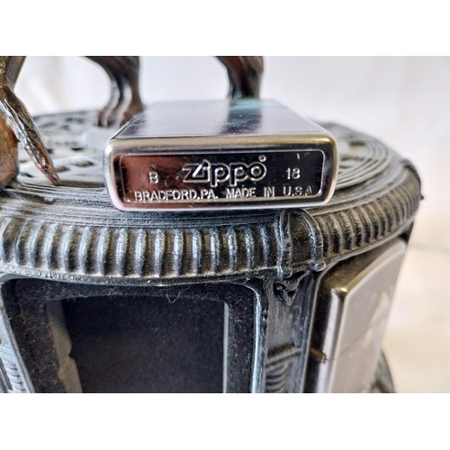 23 - 8 Alien Zippo lighters all unused with display stand (A/F)