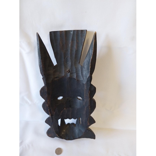 7 - vintage Asian carved wooden mask