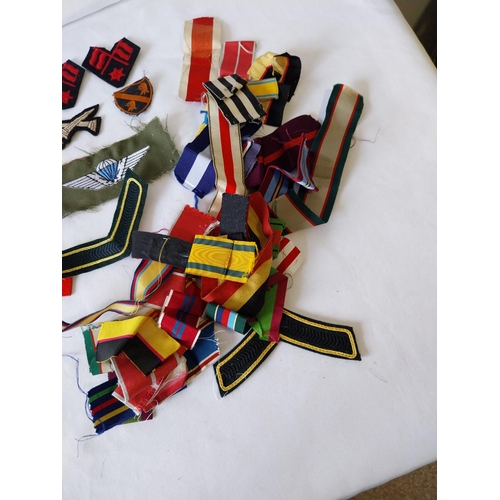 321 - quantity of military patches & ribbons