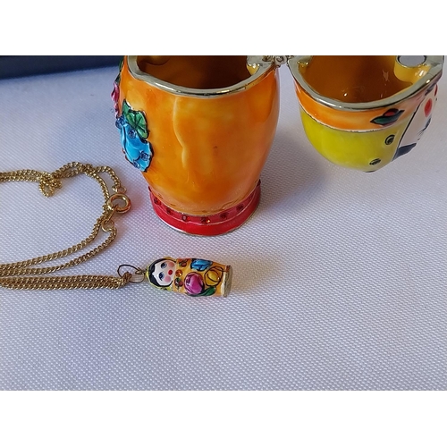 170 - Russian enamel doll pot with Russian doll necklace