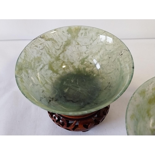 193 - Chinese carved translucent pair of tea bowls on stands