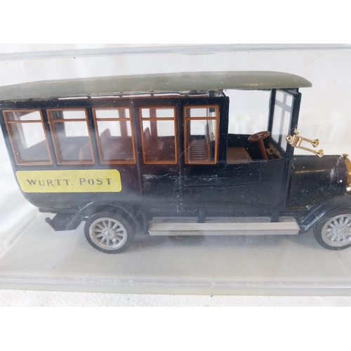 294 - cased vintage diecast bus