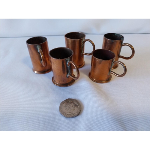 39 - 5 brass shot glasses