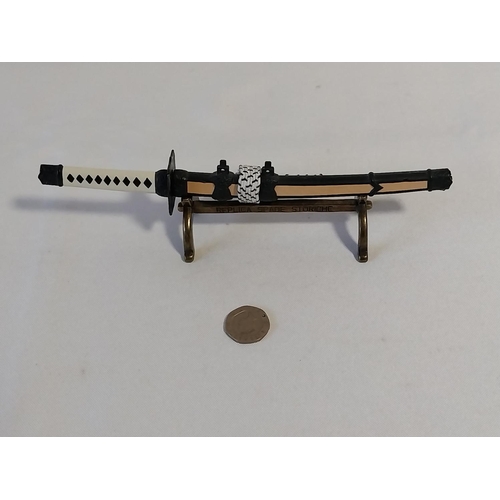 110 - Samurai sword letter opener on stand