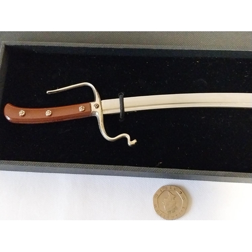 56 - Royal Armouries replica sword letter opener boxed