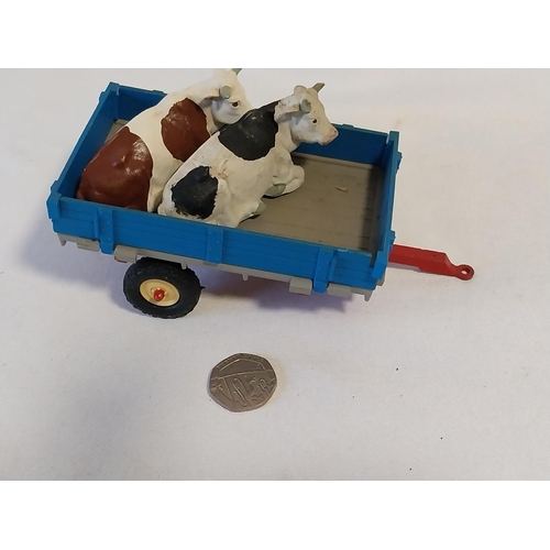 138 - Britains livestock trailer with cows