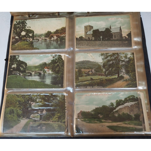 393 - A fine postcard album. The album itself is in fair condition with yellowing plastic pages, the conte... 