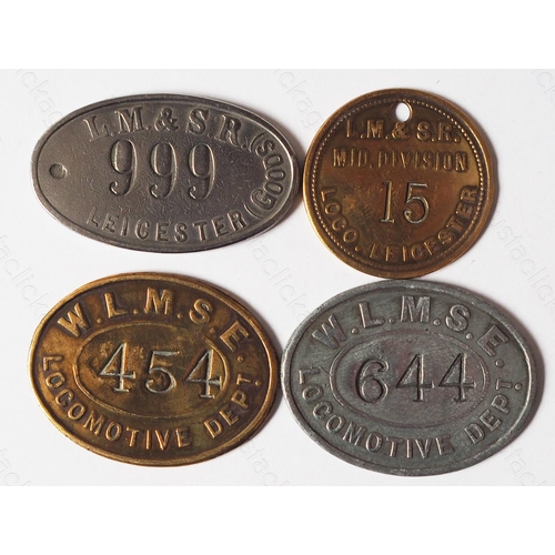 191 - Railway. Four L.M.S. Pay tokens. Includes, 2 x W.L.M.S.E.(Women employees). 1 brass loco Leicester a... 