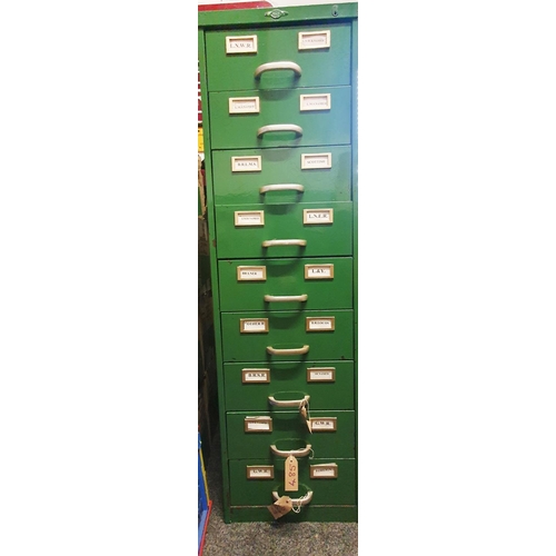 487 - Miscellaneous. A large steel empty filing cabinet with 9 sliding drawers, the contents of which have... 