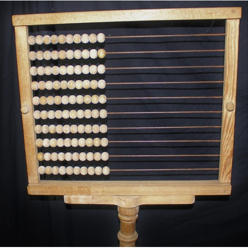 62 - PINE STANDING ABACUS ON TURNED STAND AND CAST METAL BASE (WORM AFFECTED) (H156, W59, D36cm)
