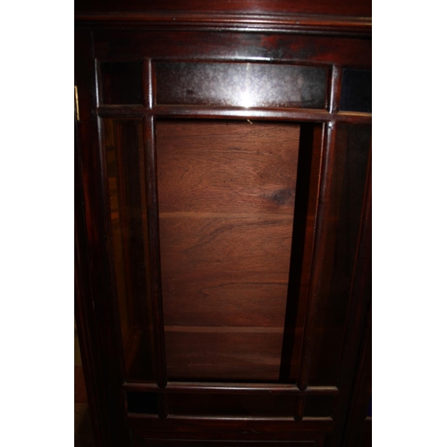 64 - MAHOGANY GLAZED TOP CABINET WITH 2 DOORS (1 PANE GLASS MISSING, 1 BROKEN) AND SHELF BELOW ON SQUARE ... 