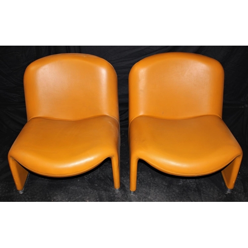 94 - PAIR MID CENTURY ORANGE VINYL LOUNGE CHAIRS