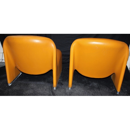 94 - PAIR MID CENTURY ORANGE VINYL LOUNGE CHAIRS