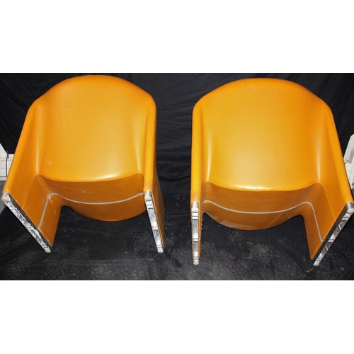 94 - PAIR MID CENTURY ORANGE VINYL LOUNGE CHAIRS