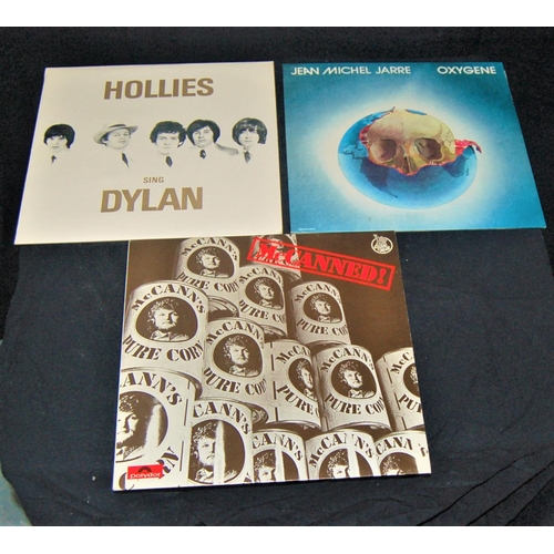 1 - 7 MOODY BLUES LPs, PAUL SIMON SONG BOOK, HOLLIES LP, JOHN McCANN McCANNED LP, JEAN MICHEL JARRE LP &... 