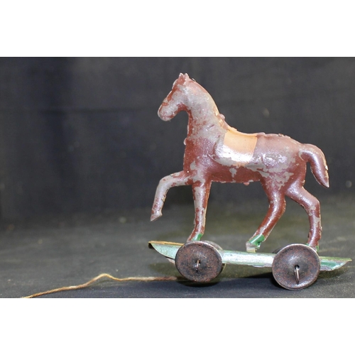 209 - VICTORIAN PULL-A-LONG TIN HORSE MADE IN CZECHOSLOVAKIA