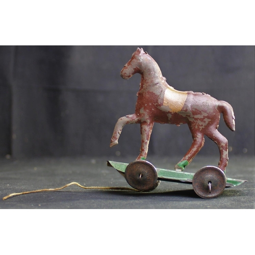 209 - VICTORIAN PULL-A-LONG TIN HORSE MADE IN CZECHOSLOVAKIA