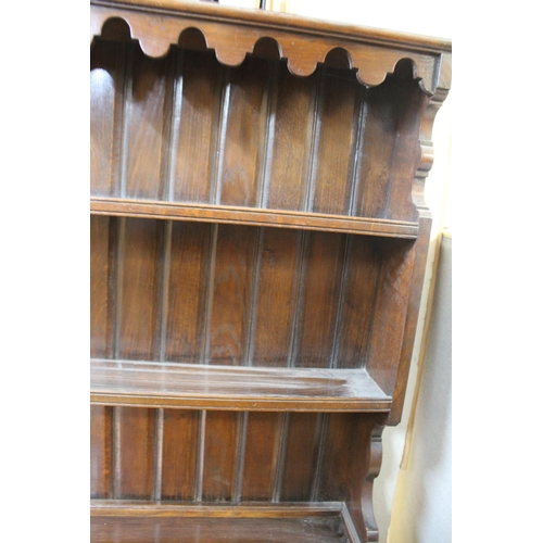 77 - OAK DRESSER WITH PLATE RACK BACK ON 3 DRAWER BASE RAISED ON TURNED LEGS (H69