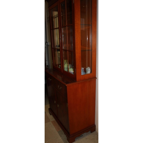 90 - YEW FINISH DISPLAY CABINET WITH CUPBOARD BASE