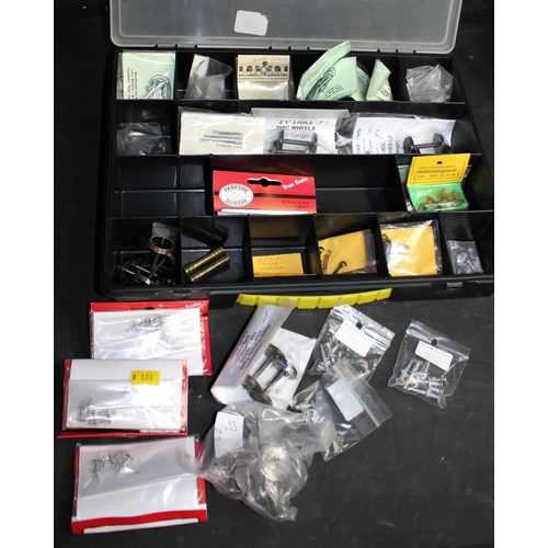 197 - PLASTIC CASE OF 7mm 0 GAUGE SPARES